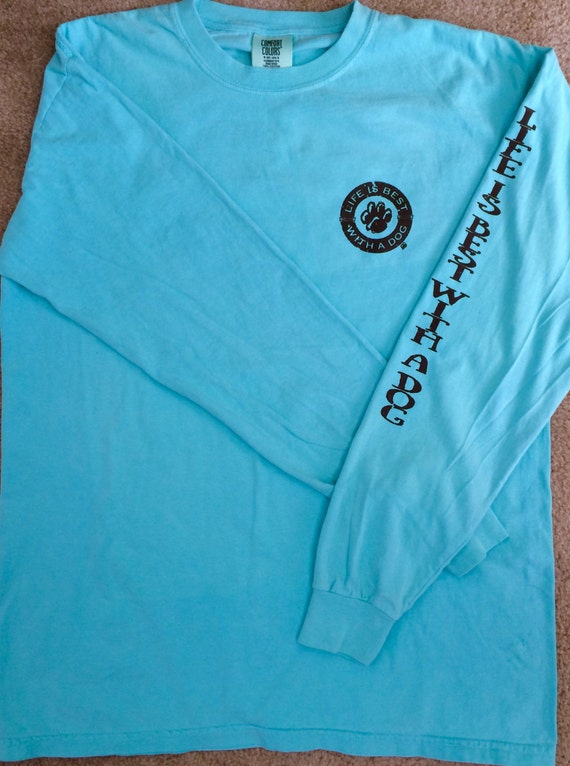 LifeIsBestWithADog' long sleeved tee custom silk screened with a left chest & sleeve logo.