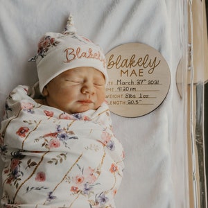 Pink floral and gold lines swaddle set with embroidered name top knot hat