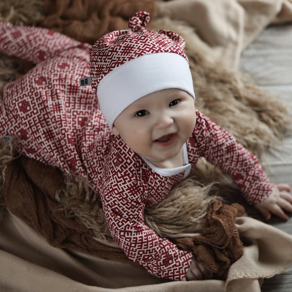 Burgundy Latvian design baby sleeper with bonnet or top knot hat, footed onepiece with snaps