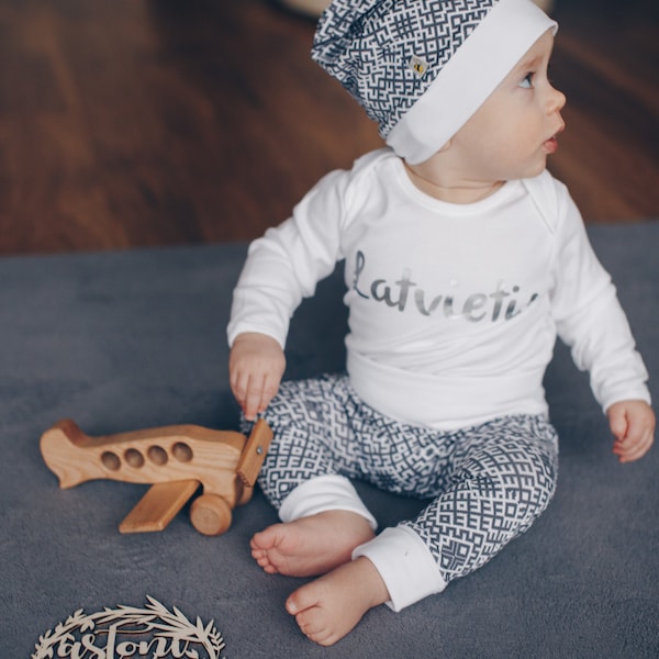 Latvian national costume inspired baby boy outfit with hat, harem type pants and bodysuit, folkloric print fabric, Latvia