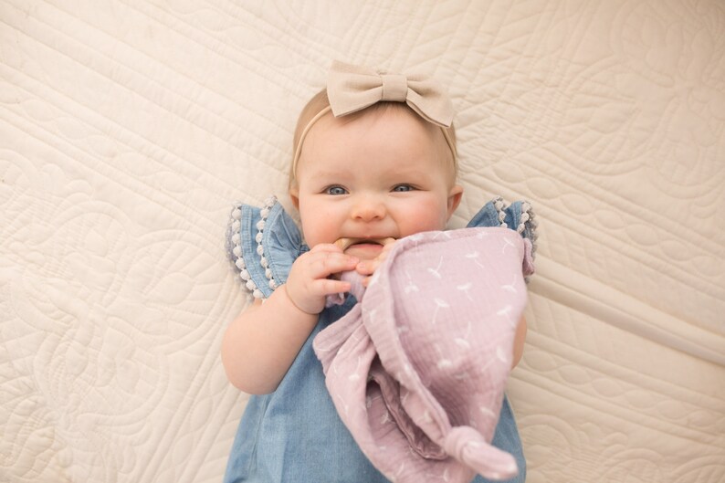 Powder pink muslin baby snuggle blanket with teether Etsy