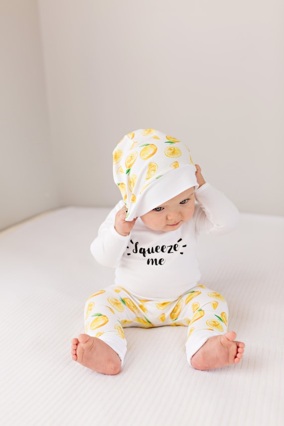 Summer baby boy outfit with fresh lemon 