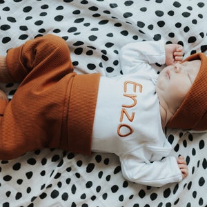 Rust brown personalized outfit with embroidered name on bodysuit, ribbed jersey
