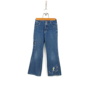 Vaqueros de niña Tweety Bird de los años 90 1999 Looney Tunes Flare Leg Size 12 Personaje de dibujos animados Cargo Jeans