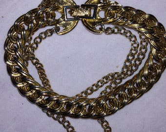 Bracelet vintage à 3 chaînes signé Monet, ton doré