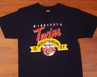1987 Minnesota Twins World Champions on a Champion T-Shirt - Fits Like a S/M - Made in the USA - Vintage Minnesota Twins T-shirt - 80's MLB