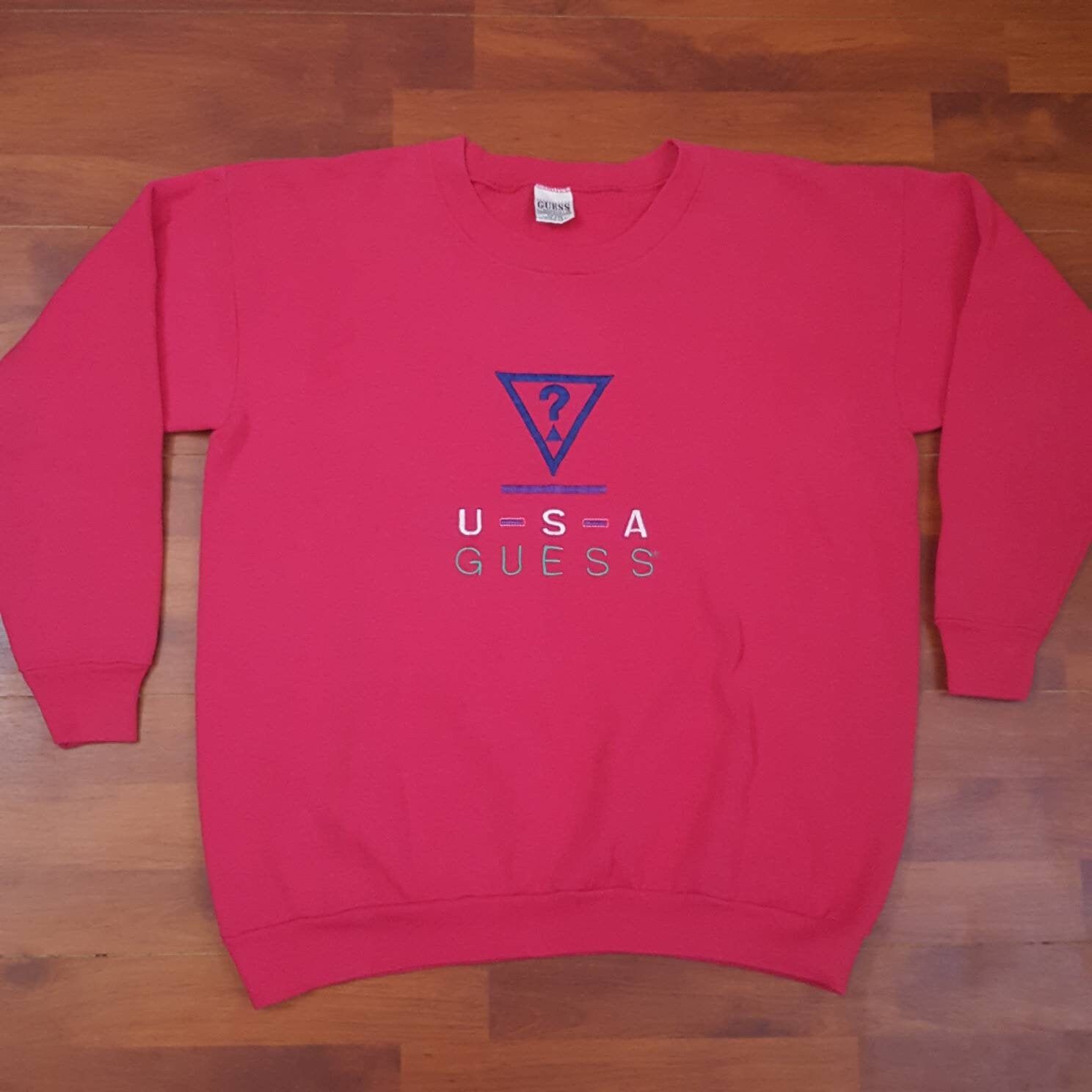 pink guess sweatshirt