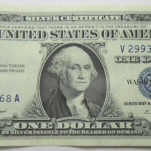 1957-B United States One Dollar Blue Seal Silver Certificate (#E89at)