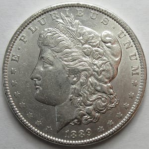 1889 Silber Morgan Dollar -AU- (#E57o)