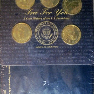 Coin History of the U.S. Presidents includes 5 brass coins with collectors book (#E104F)