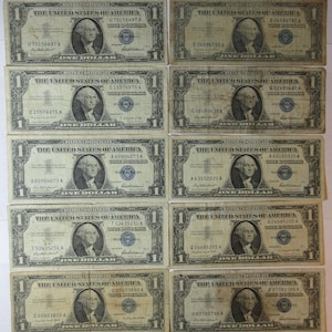 Ten 1957 One Dollar Blue Seal Silver Certificates (#E37d)