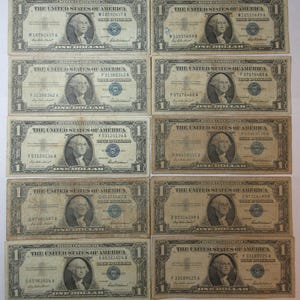 Ten 1957 One Dollar Blue Seal Silver Certificates (#E122Ja)