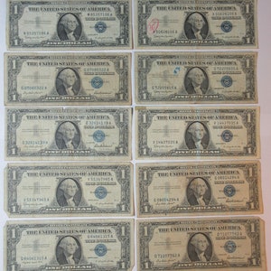 Ten 1957 One Dollar Blue Seal Silver Certificates (#E102b)