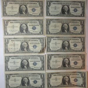 Ten 1957 One Dollar Blue Seal Silver Certificates (#E37a)