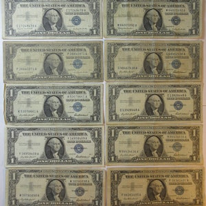 Ten 1957 One Dollar Blue Seal Silver Certificates (#E930b)