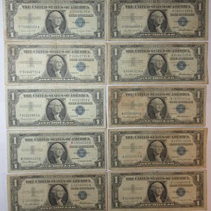 Ten 1957 One Dollar Blue Seal Silver Certificates (#E124c)