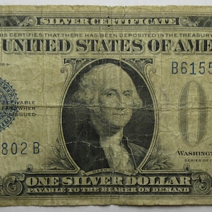 1928-A United States One Dollar Silver Certificate Funny Back (#E911f)