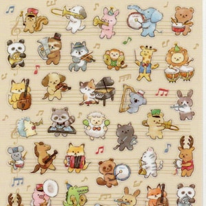 May include: Sheet of stickers featuring various animal characters playing musical instruments. The stickers include bears, cats, dogs, and other animals, each with a unique instrument. The text "MIND WAVE SEALS" is at the top.