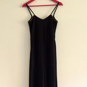 Vintage black jumpsuit, 1970s, sleeveless, gold trim, tank top