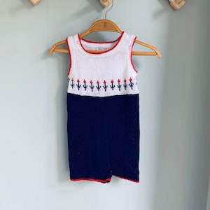Vintage baby onesie in red white and blue knit with flowers