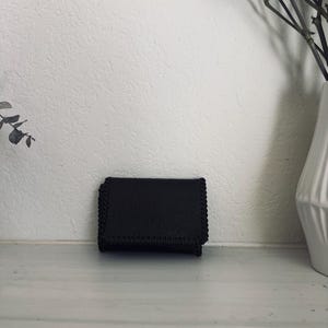 Cartera vintage de avestruz, negra, piel