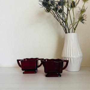 Vintage creamer / sugar bowl set, red glass
