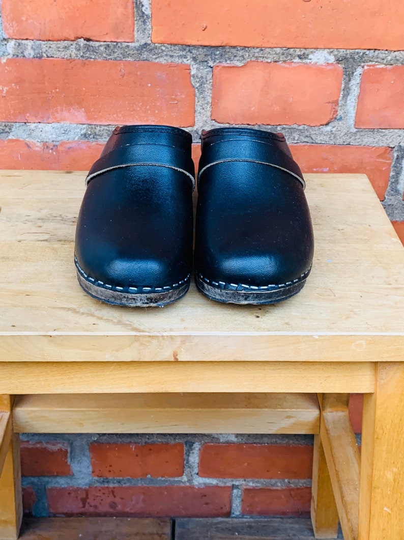 leather clogs with wooden soles