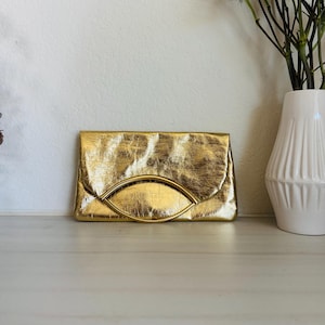 Cartera / clutch vintage dorada, piel, Italia