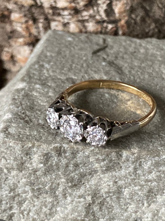 Vintage trilogy engagement ring online