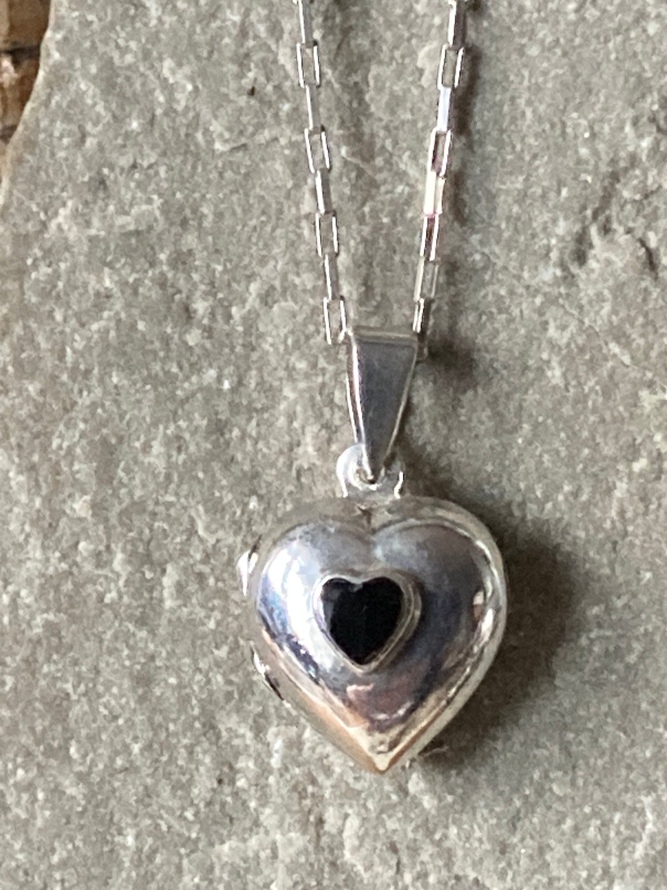 A Lovely Simple Plain Silver and Onyx Heart Shaped Locket