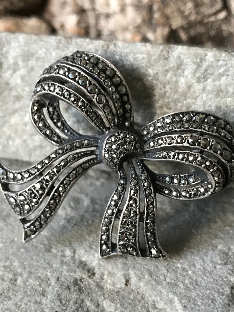 Vintage bow brooch & locket main image 0
