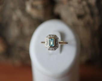 A lovely Blue Topaz And Diamond Ring SKU1540
