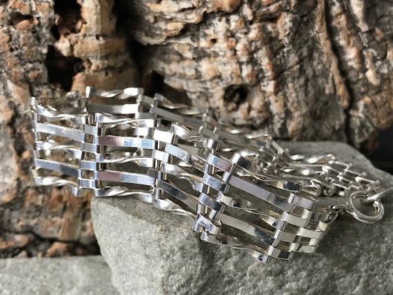 Silver clearance gate bracelet