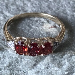 A Stunning Trilogy Red Sapphire And Diamond  Ring     SKU3822