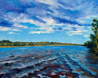 May include: An oil painting depicts a serene landscape with a body of water under a bright blue sky filled with fluffy white clouds. The water's surface reflects the sky, with visible ripples and a shoreline in the distance.
