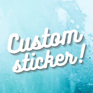 May include: White text on a blue background reads "Custom sticker!". The text has a drop shadow effect, giving it a 3D appearance. The background has a watercolor-like texture with shades of blue and white.