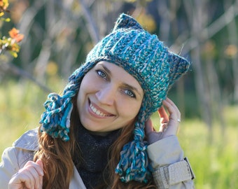 multicolored hat with cat ears and blue gray braids,  winter hat with ears flaps for animal lovers