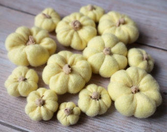 13 mini yellow fabric pumpkins with soft stem