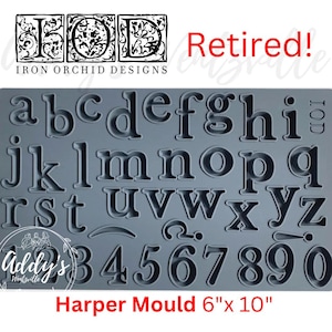 May include: A gray silicone Harper Mould by Iron Orchid Designs, featuring lowercase letters, numbers, and punctuation. The mold measures 6 inches by 10 inches. The word "Retired!" is in red text.
