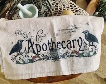 The Two Crows Apothecary - Geschirrtuch aus Baumwolle