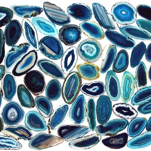 May include: A collection of blue and green agate slices with various patterns and shapes. The slices are arranged in a random pattern on a white background. The image includes the text "CRG".