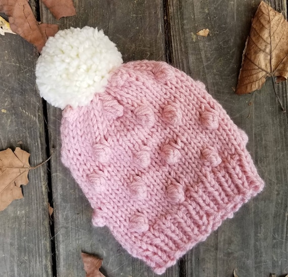 pink bobble hat baby