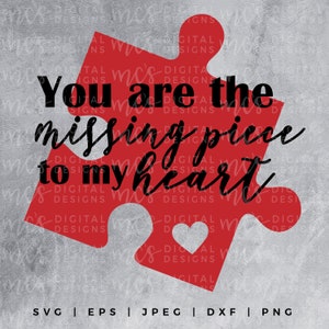 May include: A red jigsaw puzzle piece with the words "You are the missing piece to my heart" in black script. A white heart is cut out of the puzzle piece. The background is a textured grey.
