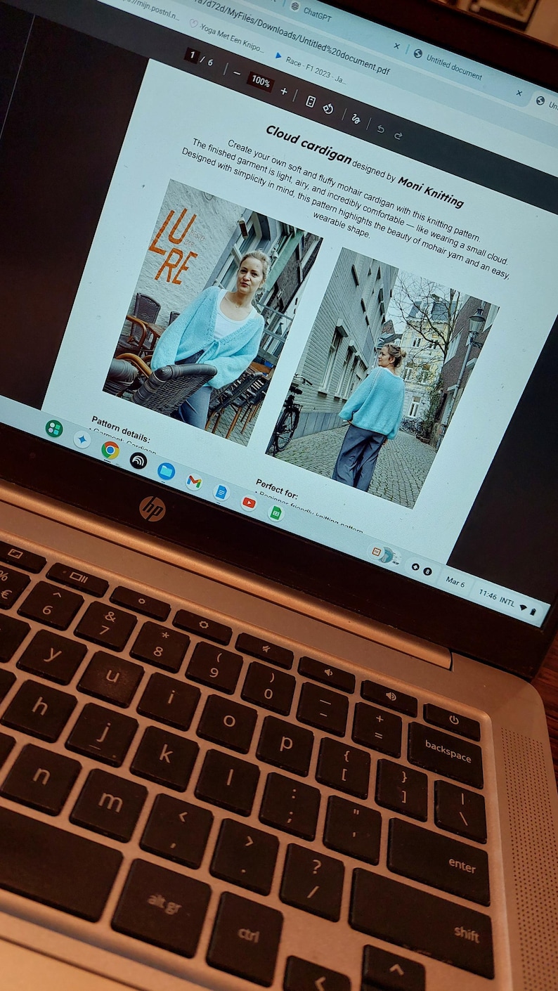 May include: A laptop screen displays a knitting pattern for a cloud cardigan. The pattern, designed by Moni Knitting, features a light blue cardigan. The text describes the garment as light, airy, and comfortable, highlighting the beauty of mohair yarn.