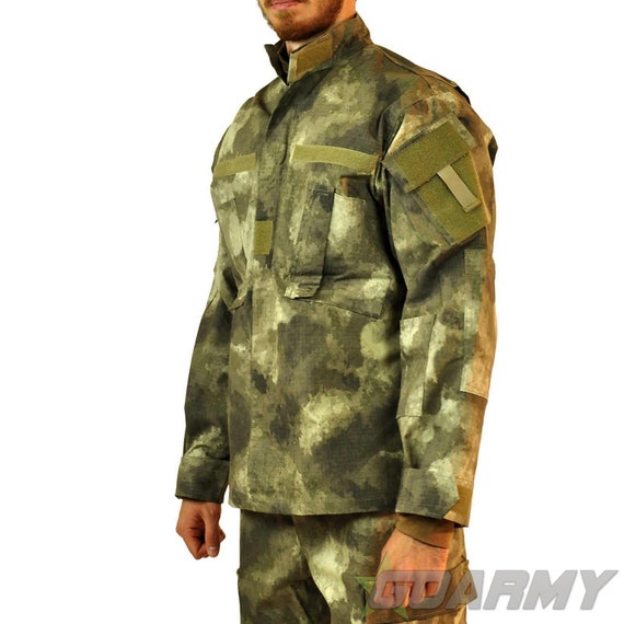 Костюм атакс фг. Атакс fg камуфляж. Акс атакс. A-tacs fg камуфляж. Камуфляж a-tacs ghost.