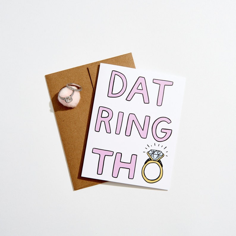 dat ring tho engagement card paired with engagement ring and kraft envelope