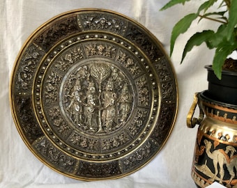 Antique Indian tray, known as a wedding tray, in silver and embossed copper, finely chiseled on a brass base