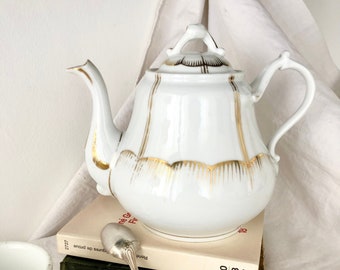 Large old French white porcelain teapot