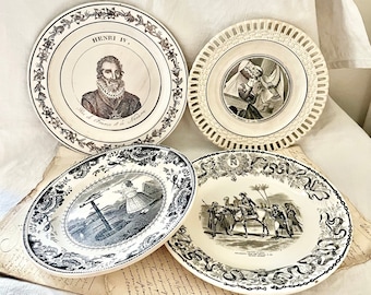 Set of old French earthenware plates with black historical decoration