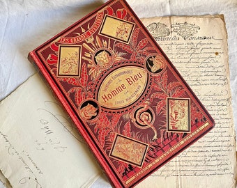 19th century French book with beautiful old red and gold binding The Extraordinary Adventures of a Blue Man by Louis Boussenard